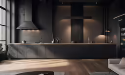 a sleek modern looking kitchen has dark walls