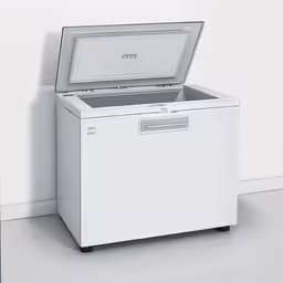 the chest contains a top drawer and an open drawer