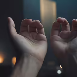 a person making the frame for a shot with his hands
