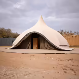 there are several big tents that are set up outside