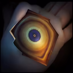 a hand holding up a picture with a hole