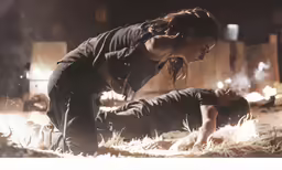 the young woman is attempting to wrestle her friend
