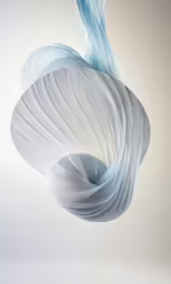 there are a couple of small blue objects hanging from a string
