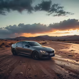 a silver sports car on the side of a dirt road