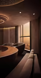 a modern lounge with an amazing view overlooking the city