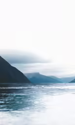there is a boat sailing in the water