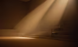 a light is coming in through a pair of windows