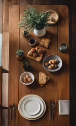 a wooden table with a few plates and bowls