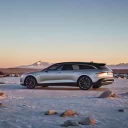 an suv parked in the snow on top of a field