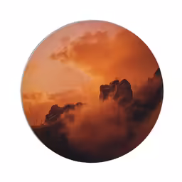 a circular picture with a few rocks on top