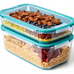 a close up of three containers filled with food
