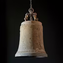 the bell is made of cement with several bronze decorations