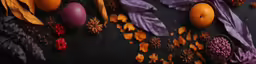 an array of oranges, berries and feathers on a black surface