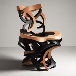a sculpture made with black and brown leather