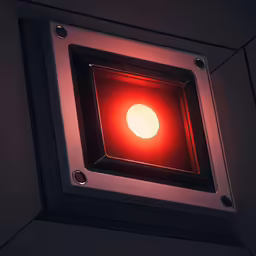 a red light in the ceiling of an old building