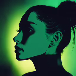 an artistic photo of a woman with long hair,a woman has her face in profile in green light