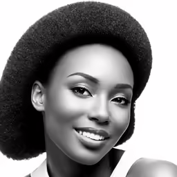 a beautiful woman in an afro wig and shirt