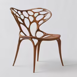 an intricately designed chair against a plain background