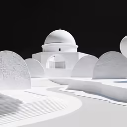 a photo taken at night of white structures