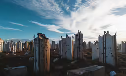 the old stone cemetery is surrounded by many heads of heads