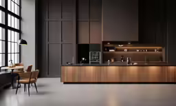 the kitchen features a sleek design and a modern flair