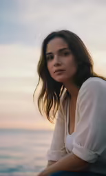a close up of a person near water
