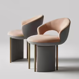 two modern chairs on a grey surface