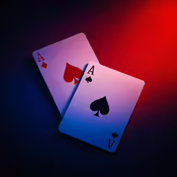 two cards of playing cards sit next to each other