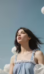 an asian woman with her hair blowing in the wind