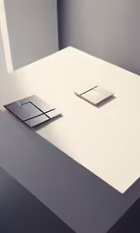 two metal objects sit on top of a counter