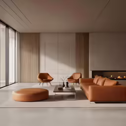 a living room with a couch, chair and fireplace