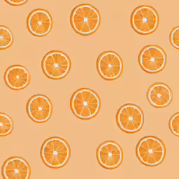 orange slices sitting on top of an orange background