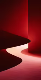 an abstract photo with curves and red lighting