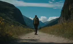 the person is on the trail in the mountains