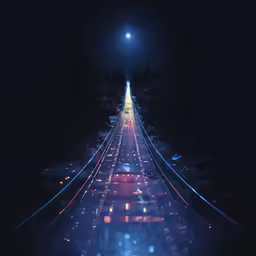 an image of a train tracks going through the night