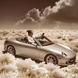 a woman in a convertible vehicle sits in a desert landscape