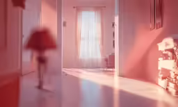 an image of a hallway scene with red lamps