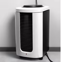 an air conditioner sitting in front of a white wall