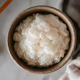 white rice in a bowl on the counter