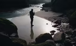 a person is standing on rocks and water