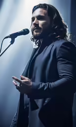 the singer in front of a microphone