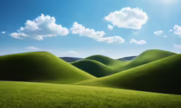 green hills with a cloud filled blue sky