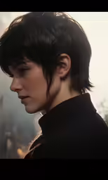 woman with dark hair wearing jacket, looking down