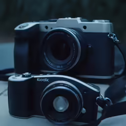a camera sitting on top of a wooden table