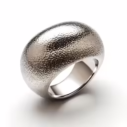 an unusual ring that features a textured surface