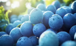blue berries are stacked on top of each other