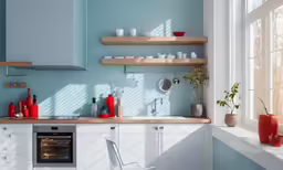an empty kitchen with various items displayed on shelves