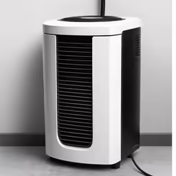 a close up of a small air purigerator in front of a wall
