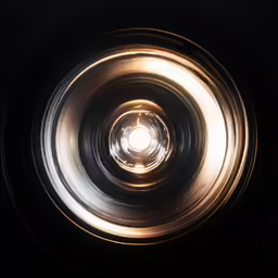 a metal object with lights in the middle