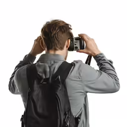 a man with a camera taking a picture